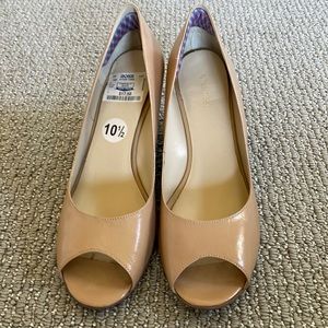 Wedge heel in neutral tan color.